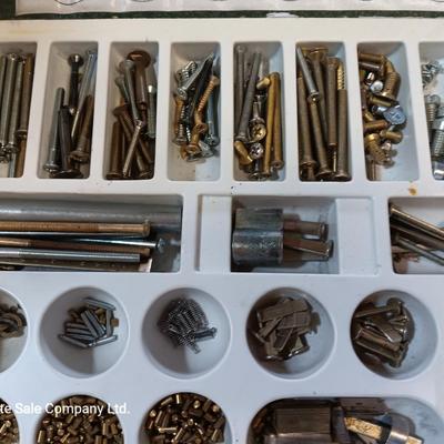 Metal box full of Wesklock keying kit hardware