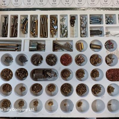 Metal box full of Wesklock keying kit hardware