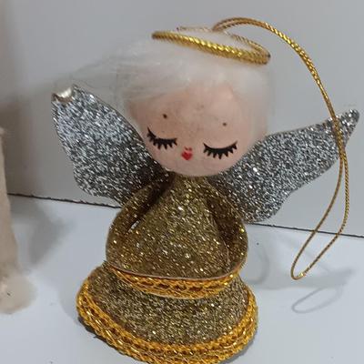 Antique plastic bell ornaments and tree topper with a primitive handmade Snowman