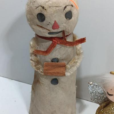 Antique plastic bell ornaments and tree topper with a primitive handmade Snowman