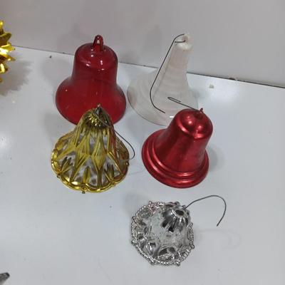 Antique plastic bell ornaments and tree topper with a primitive handmade Snowman