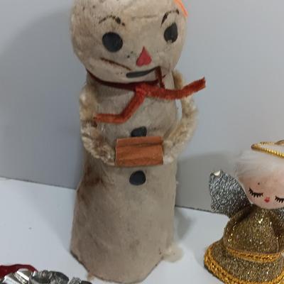 Antique plastic bell ornaments and tree topper with a primitive handmade Snowman