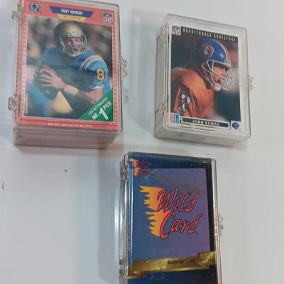 Football cards in plastic cases