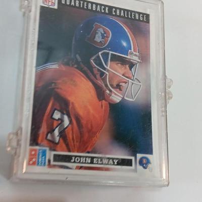 Football cards in plastic cases