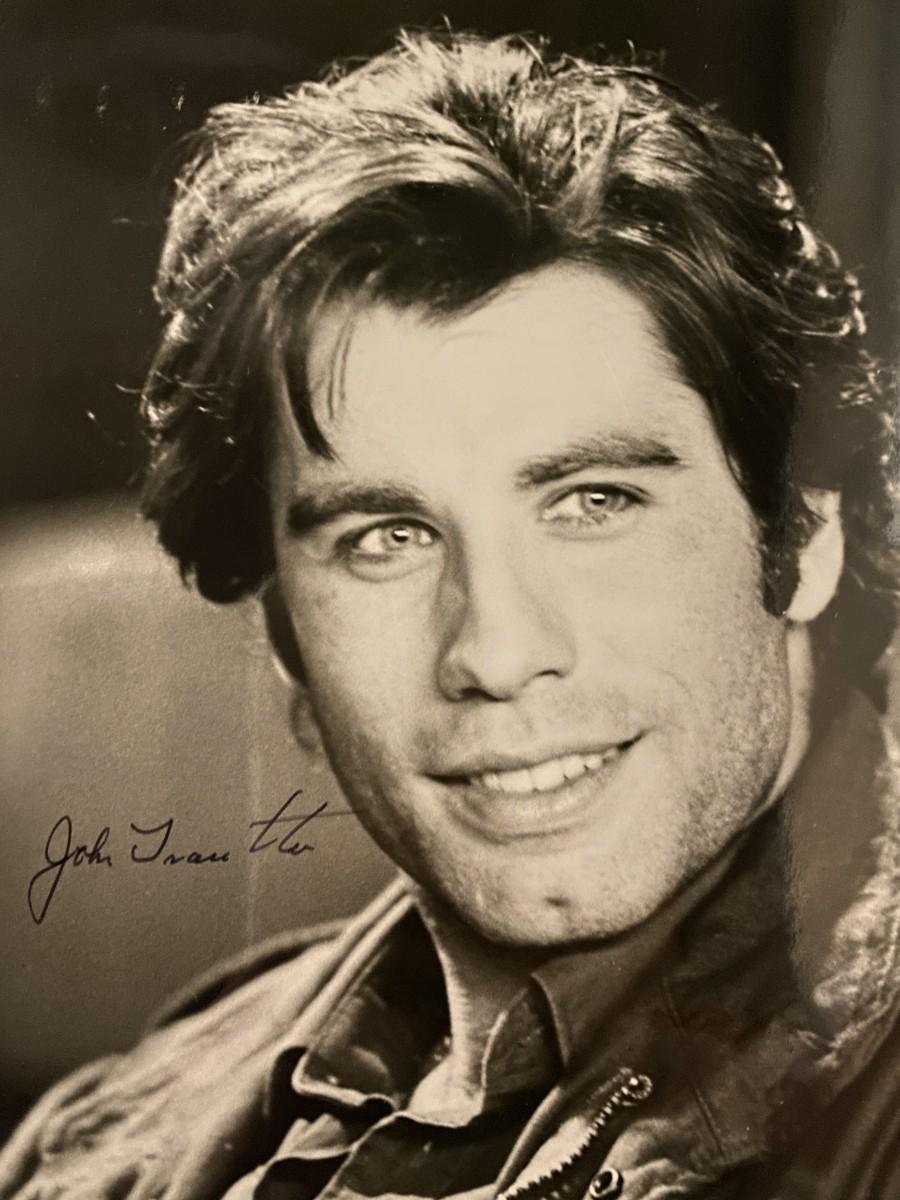 John Travolta signed photo | EstateSales.org