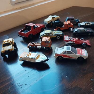 AN ASSORTMENT OF VINTAGE TOY CARS