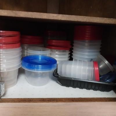 CUPBOARD FULL OF MOSTLY SINGLE SERVE FOOD STORAGE CONTAINERS