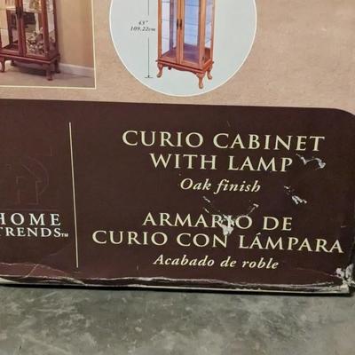 New in Box Lighted Curio Cabinet