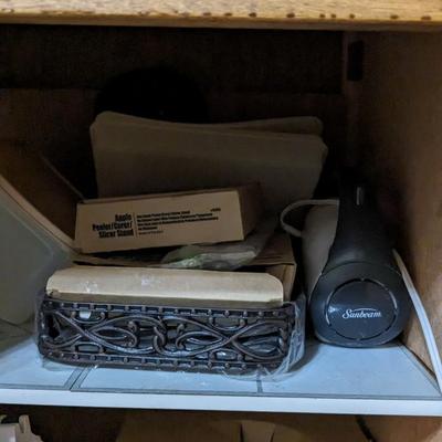Contents of East Kitchen Cabinets 