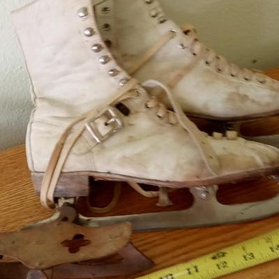 LOT 12 TWO OLD SETS OF ICE SKATES