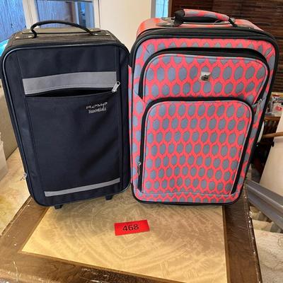 2 newer roller suit cases