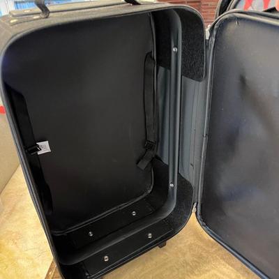 2 newer roller suit cases