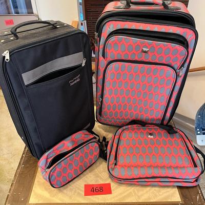 2 newer roller suit cases