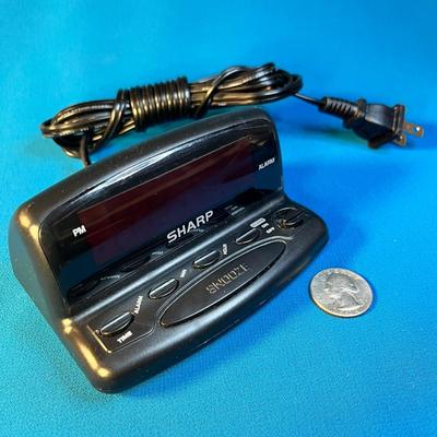 SMALL SHARP ELECTRIC ALARM CLOCK