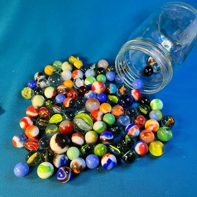 HALF PINT JAR FULL OF ASSORTED MARBLES