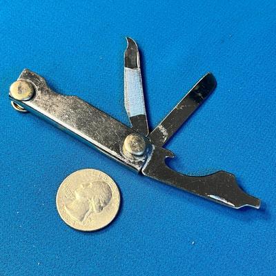 POCKET MULTI-TOOL: FILE, BOTTLE OPENER, SCREWDRIVER, BLADE