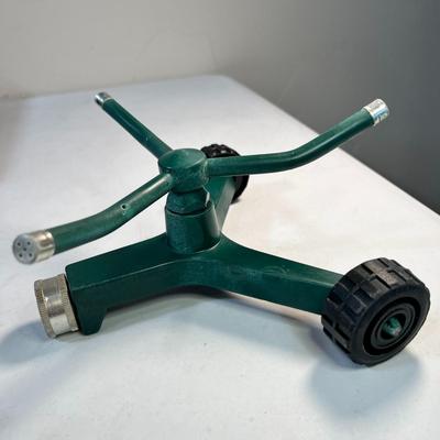 SPINNING HOSE SPRINKLER