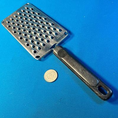 HAND HELD GRATER