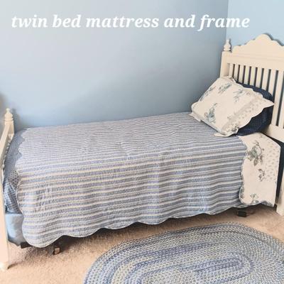 Twin Bed Matress and Frame  (bedding not included)