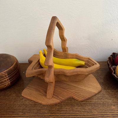 FAUX FRUIT IN A WOODEN LOKE BOWL, FOLDING WOOD BASKET AND MORE