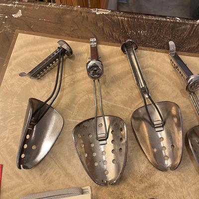 Shoe horns, stretchers, and shoe laces
