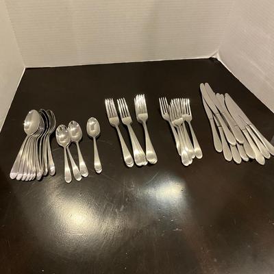 196 Set of Unmarked Stainless Steel Flatware