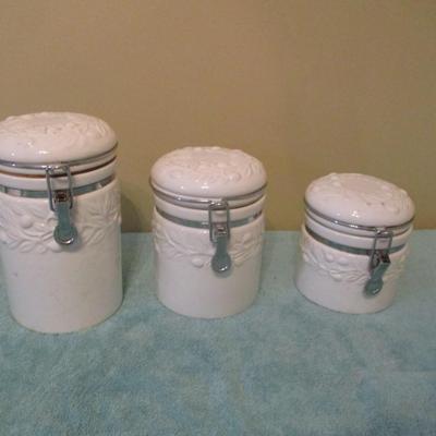 Set of Three Ceramic Kitchen Canisters with Bale Top Lids