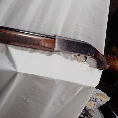 Winchester Model  59 12 gauge shot gun/semi-auto RIOT gun. est.$300 to $700.