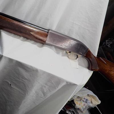 Winchester Model  59 12 gauge shot gun/semi-auto RIOT gun. est.$300 to $700.
