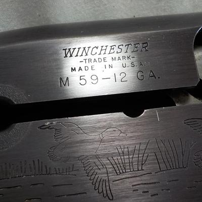 Winchester Model  59 12 gauge shot gun/semi-auto RIOT gun. est.$300 to $700.