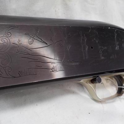 Winchester Model  59 12 gauge shot gun/semi-auto RIOT gun. est.$300 to $700.