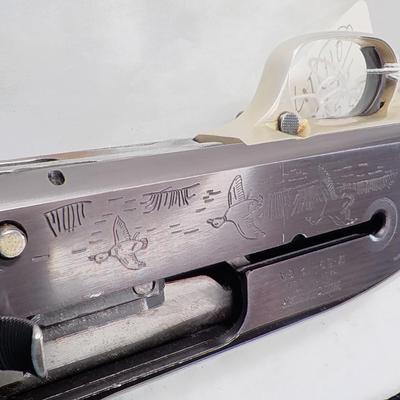 Winchester Model  59 12 gauge shot gun/semi-auto RIOT gun. est.$300 to $700.