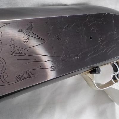 Winchester Model  59 12 gauge shot gun/semi-auto RIOT gun. est.$300 to $700.