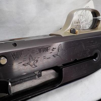 Winchester Model  59 12 gauge shot gun/semi-auto RIOT gun. est.$300 to $700.