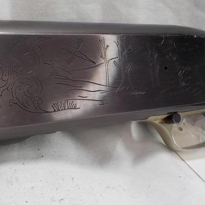 Winchester Model  59 12 gauge shot gun/semi-auto RIOT gun. est.$300 to $700.