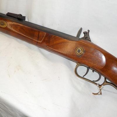 Flintlock black powder 50 cal. Thompson Center Arms, NH. est. $250 to $450.