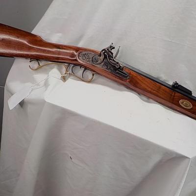 Flintlock black powder 50 cal. Thompson Center Arms, NH. est. $250 to $450.
