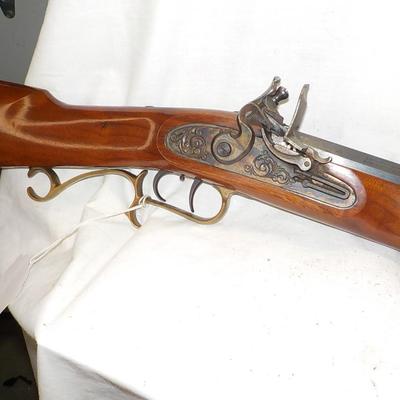 Flintlock black powder 50 cal. Thompson Center Arms, NH. est. $250 to $450.