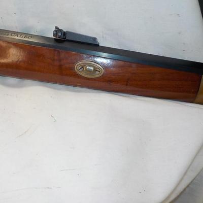 Flintlock black powder 50 cal. Thompson Center Arms, NH. est. $250 to $450.