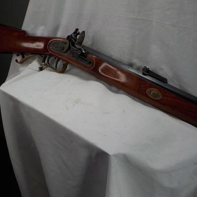 Flintlock black powder 50 cal. Thompson Center Arms, NH. est. $250 to $450.