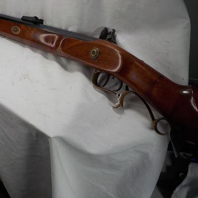 Flintlock black powder 50 cal. Thompson Center Arms, NH. est. $250 to $450.