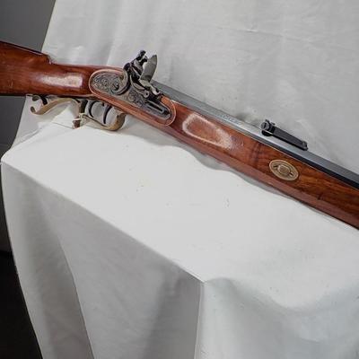 Flintlock black powder 50 cal. Thompson Center Arms, NH. est. $250 to $450.