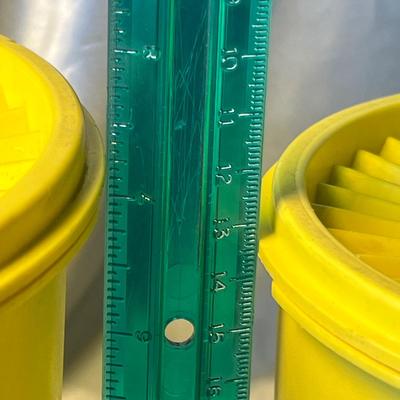 Yellow Tupperware canisters