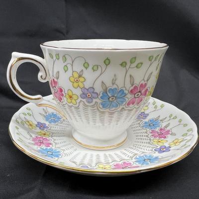 Tuscan Fine English Bone China Floral Bright Cheeful Cup and Saucer Gold Trimmed Numbered Made in England