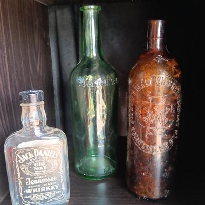 Three vintage bottles Duffy Malt Whisky - Jack Daniels and green Maderd