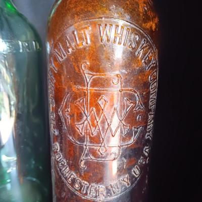 Three vintage bottles Duffy Malt Whisky - Jack Daniels and green Maderd