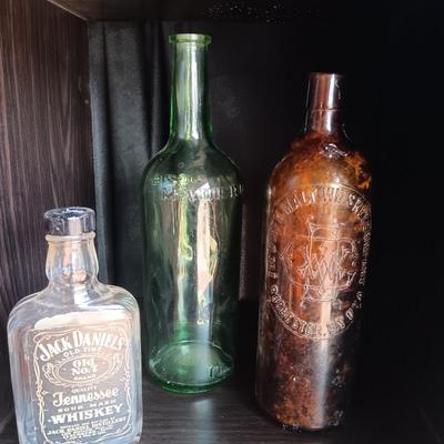 Three vintage bottles Duffy Malt Whisky - Jack Daniels and green Maderd