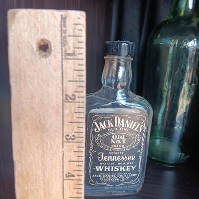 Three vintage bottles Duffy Malt Whisky - Jack Daniels and green Maderd