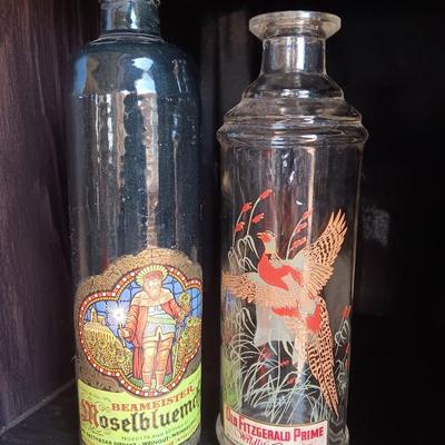 Beameister Noselbluemhen crock bottle with Old Fitzgerald Prime Wildlife glass bottle