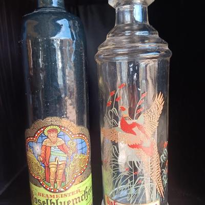 Beameister Noselbluemhen crock bottle with Old Fitzgerald Prime Wildlife glass bottle